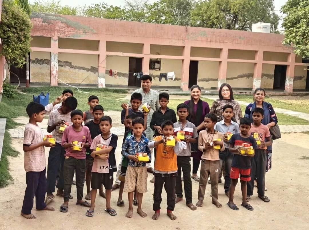 AAS India Foundation team with children during a community support visit